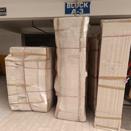 Furniture packed with corrugated protection – Reliable Packers & Movers